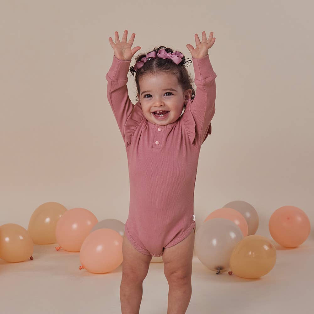 Snuggle Hunny - Jewel Pink Rib Long Sleeve Organic Bodysuit with Frill